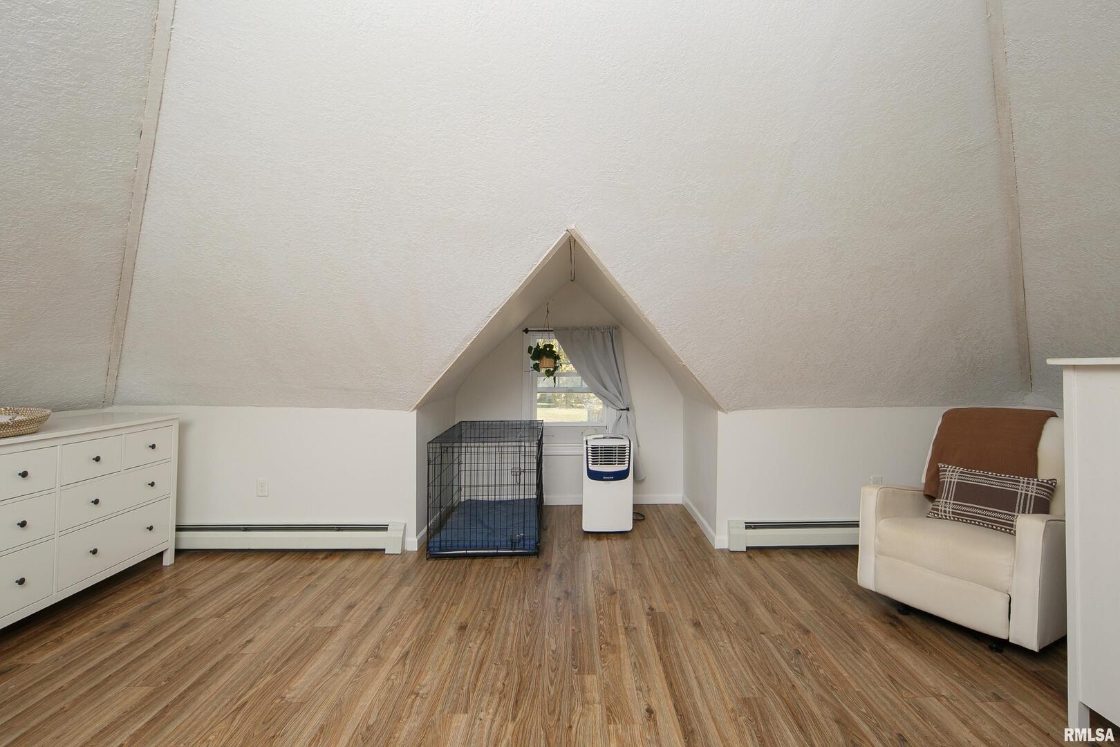 401 3rd Street Matherville, IL 61263 - Photo 22 of 32 a view of livingroom with furniture and wooden floor