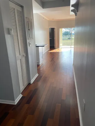 a view of entryway with wooden floor
