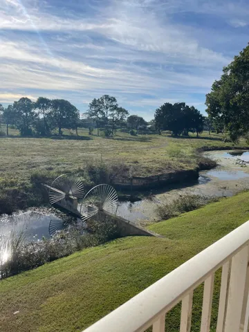 a view of a lake with a big yard
