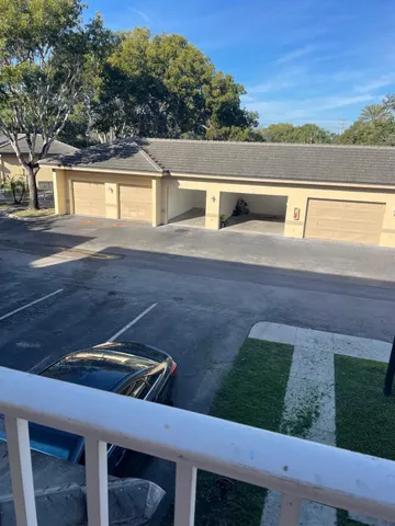 a view of swimming pool with a yard