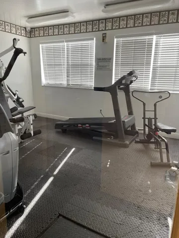 a view of a room with gym equipment