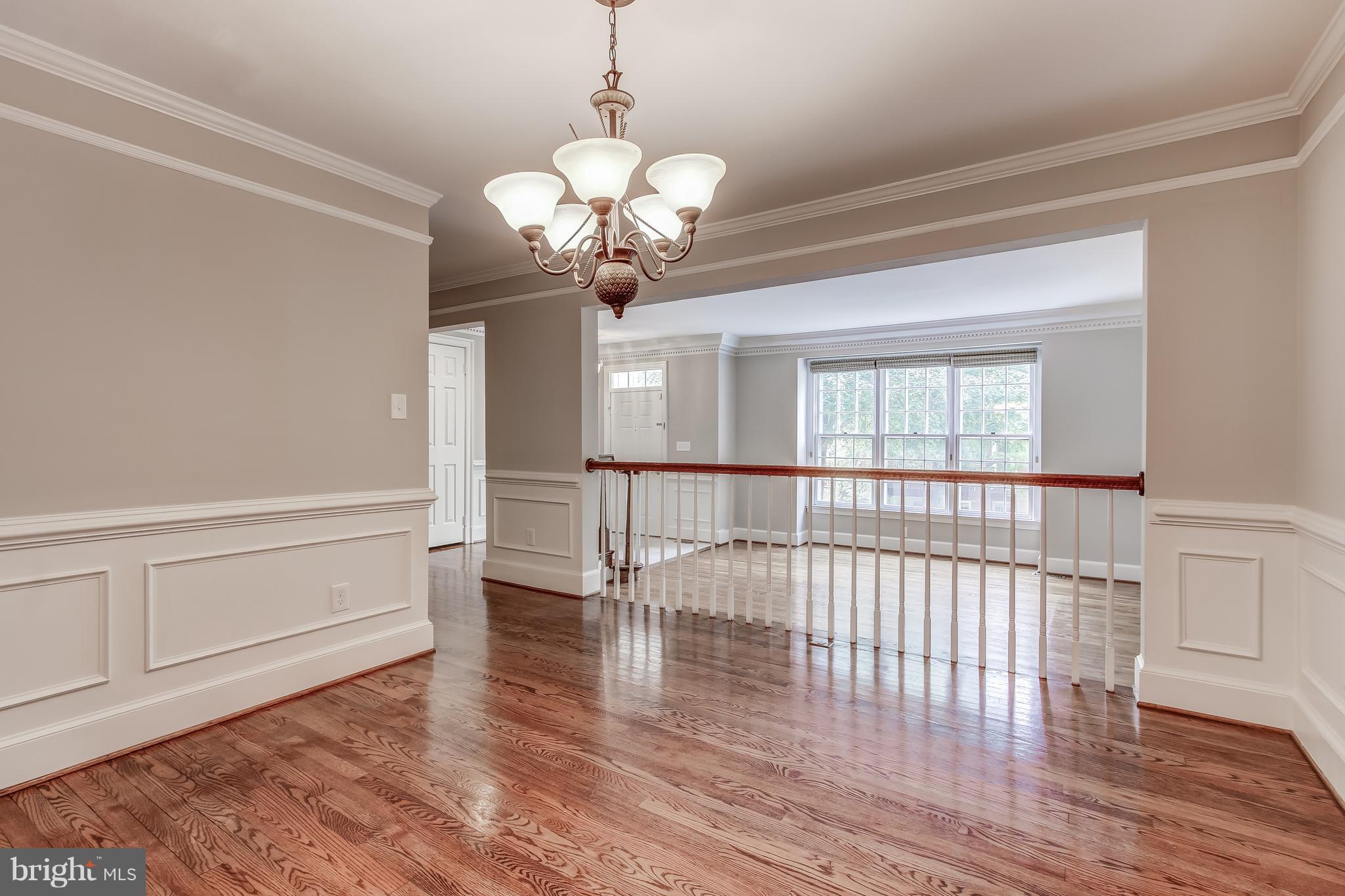 8053 Rising Ridge Road Bethesda, MD 20817 - Photo 8 of 30 a view of a livingroom with wooden floor