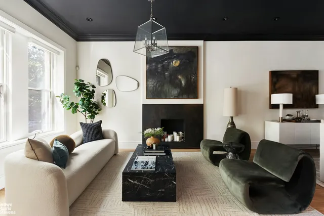 a picture of a bathroom with a shower