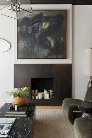 a living room with furniture fireplace and flat screen tv