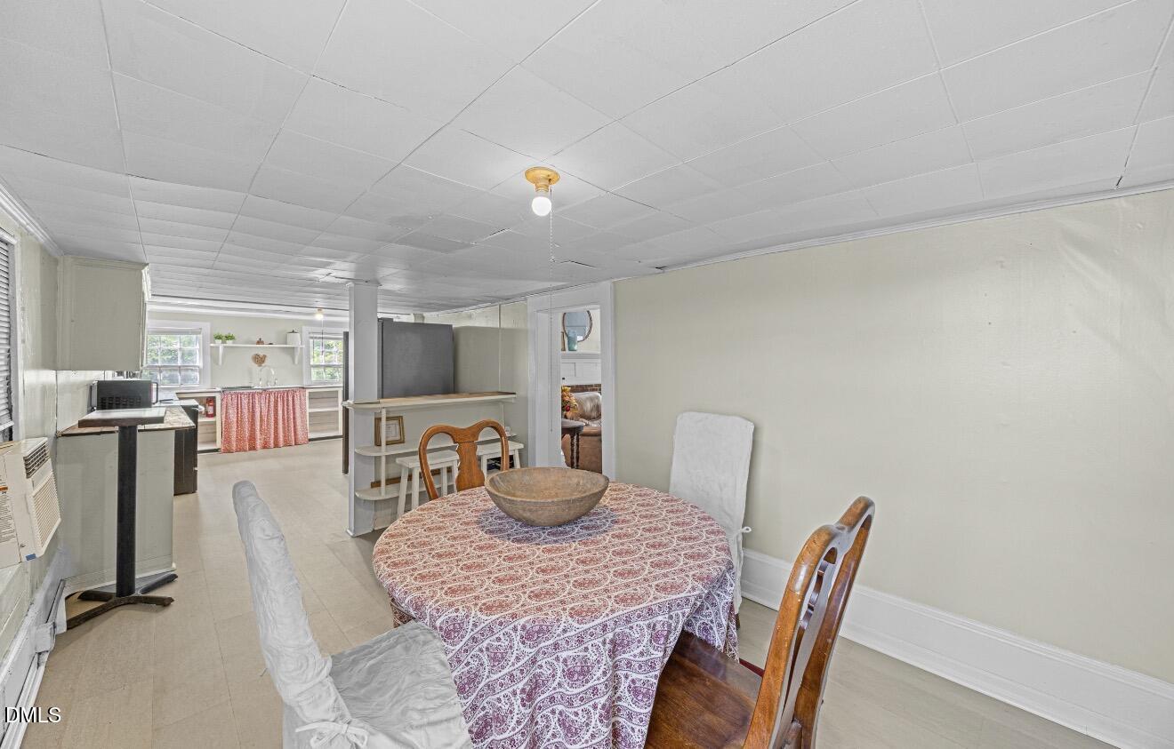679 Mintz Road Roseboro, NC 28382 - Photo 16 of 80 a dining room with furniture and window
