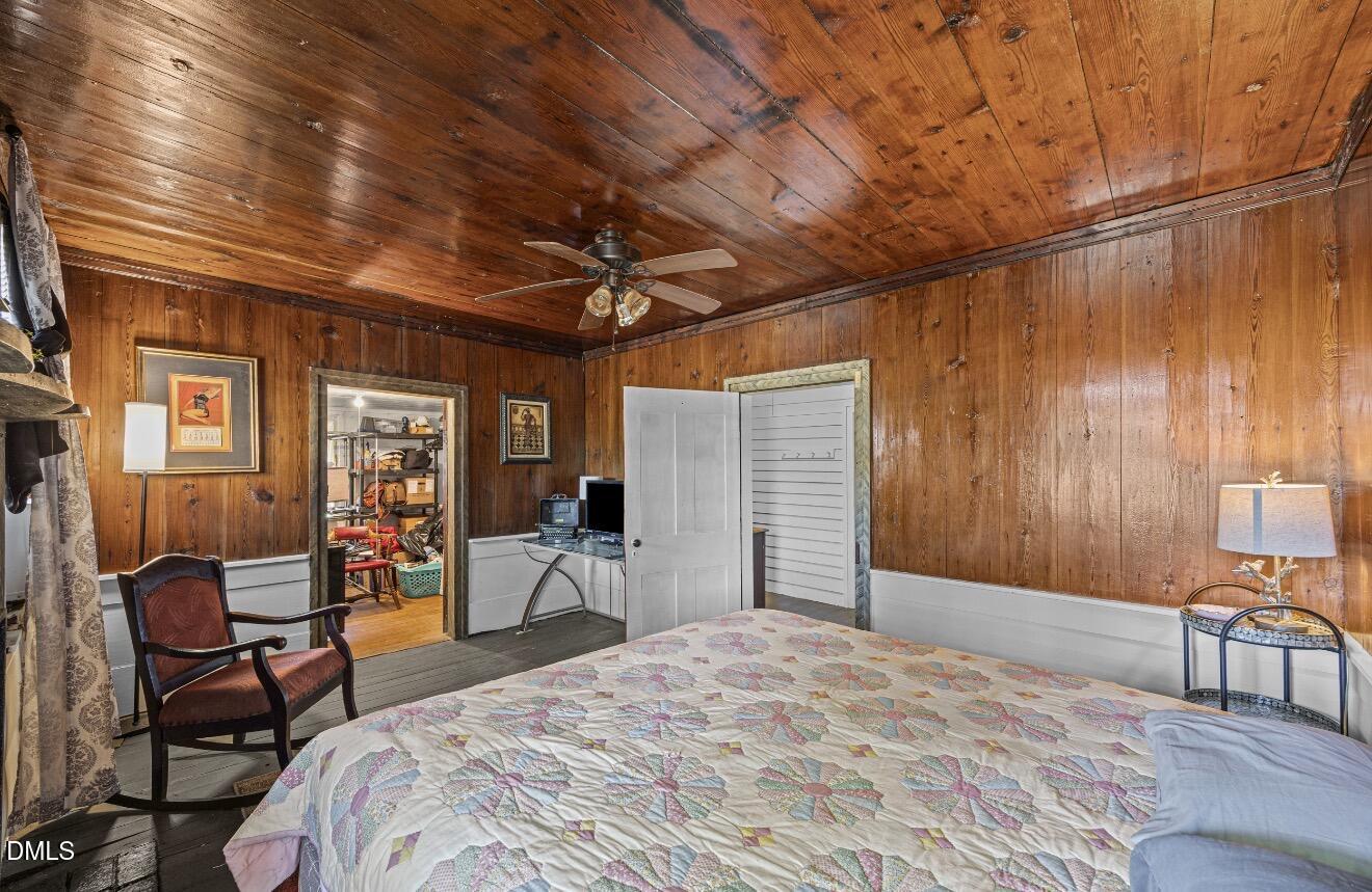 679 Mintz Road Roseboro, NC 28382 - Photo 18 of 80 a bed room with a bed and a chair