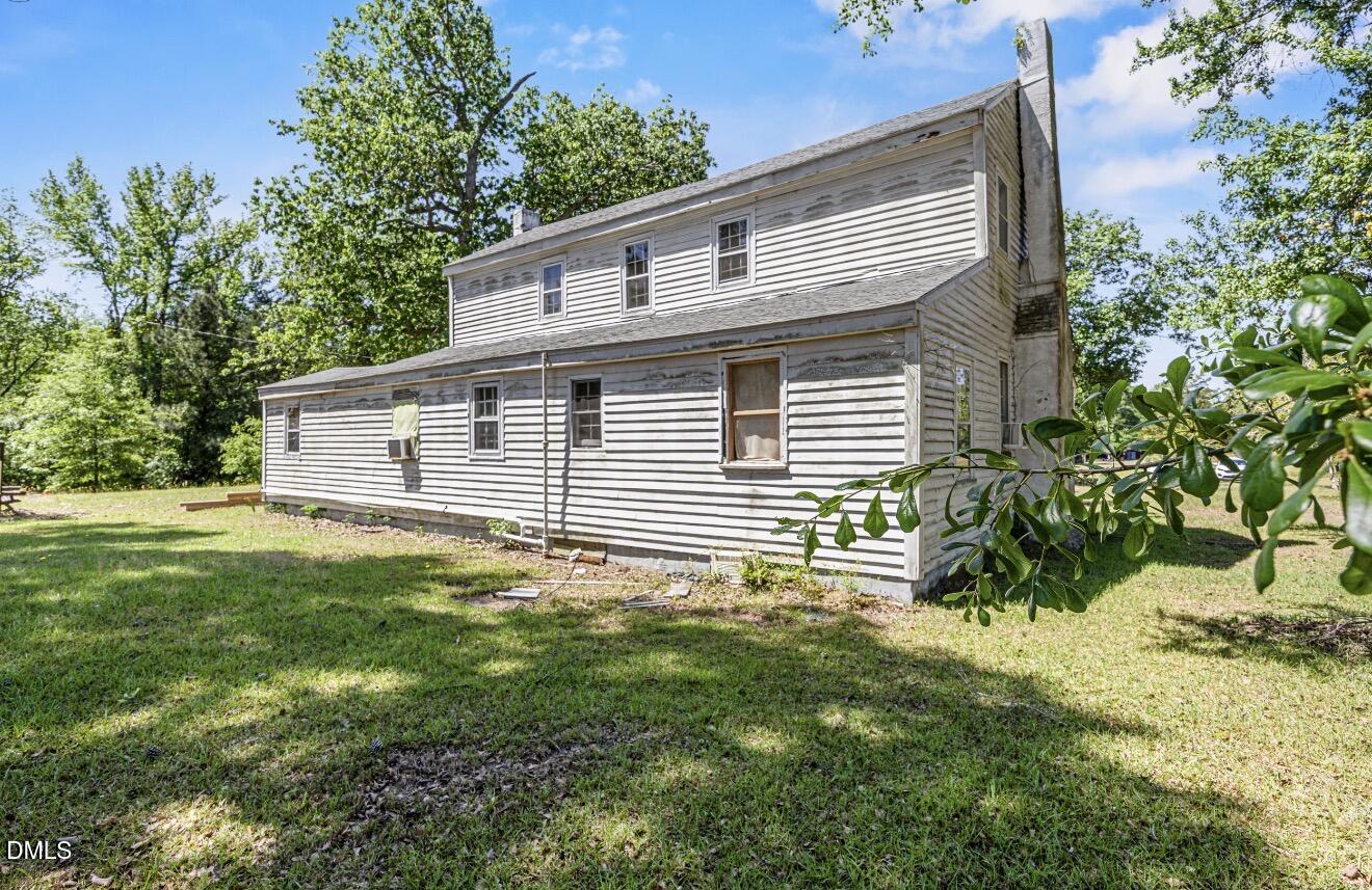 679 Mintz Road Roseboro, NC 28382 - Photo 33 of 80 a view of a house with a backyard