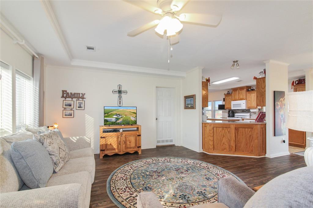 455 Hughes Cemetery Road Italy, TX 76651 - Photo 7 of 40 a living room with furniture and wooden floor