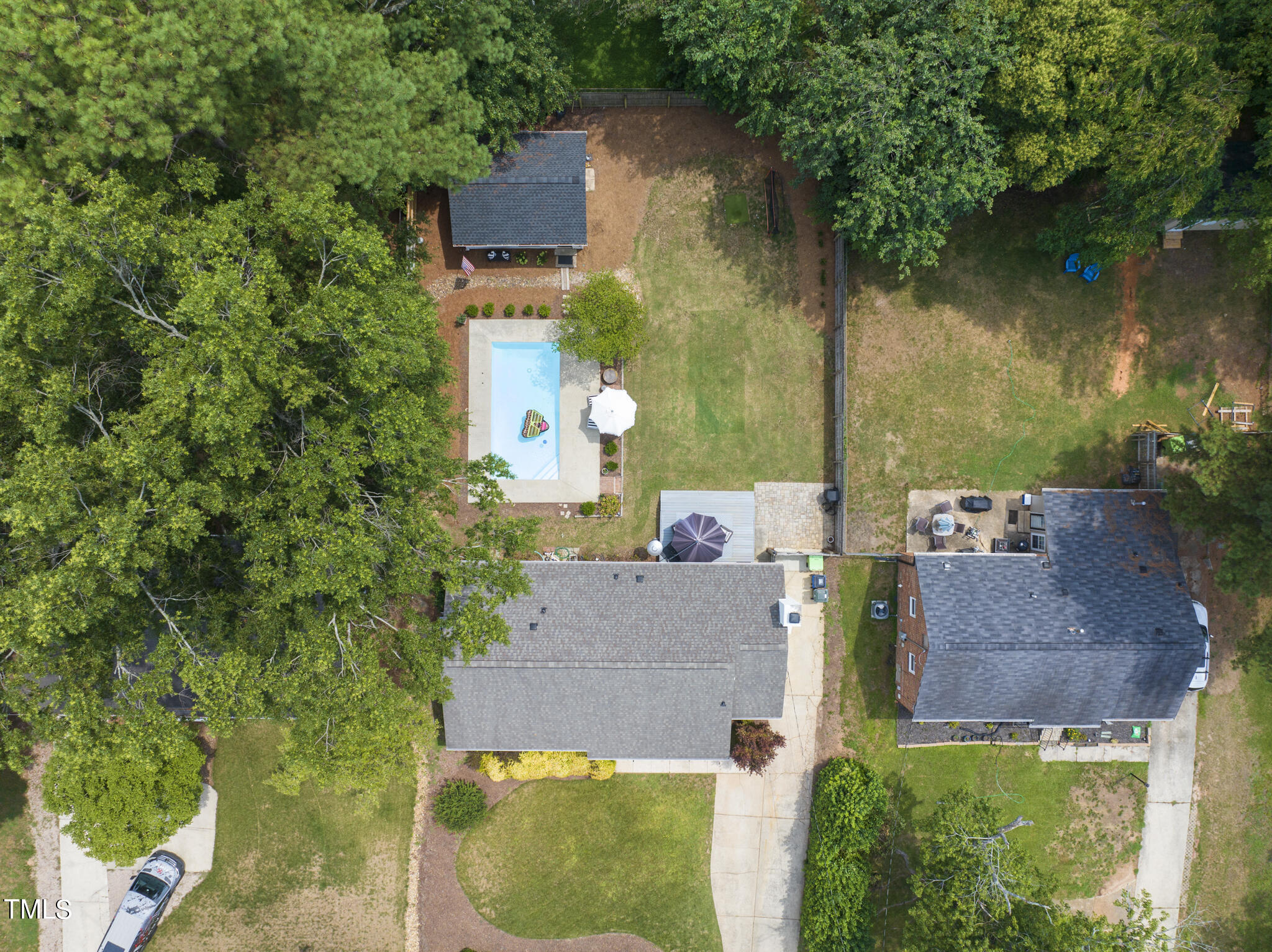 512 East Millbrook Road Raleigh, NC 27609 - Photo 27 of 29 an aerial view of a house with a yard