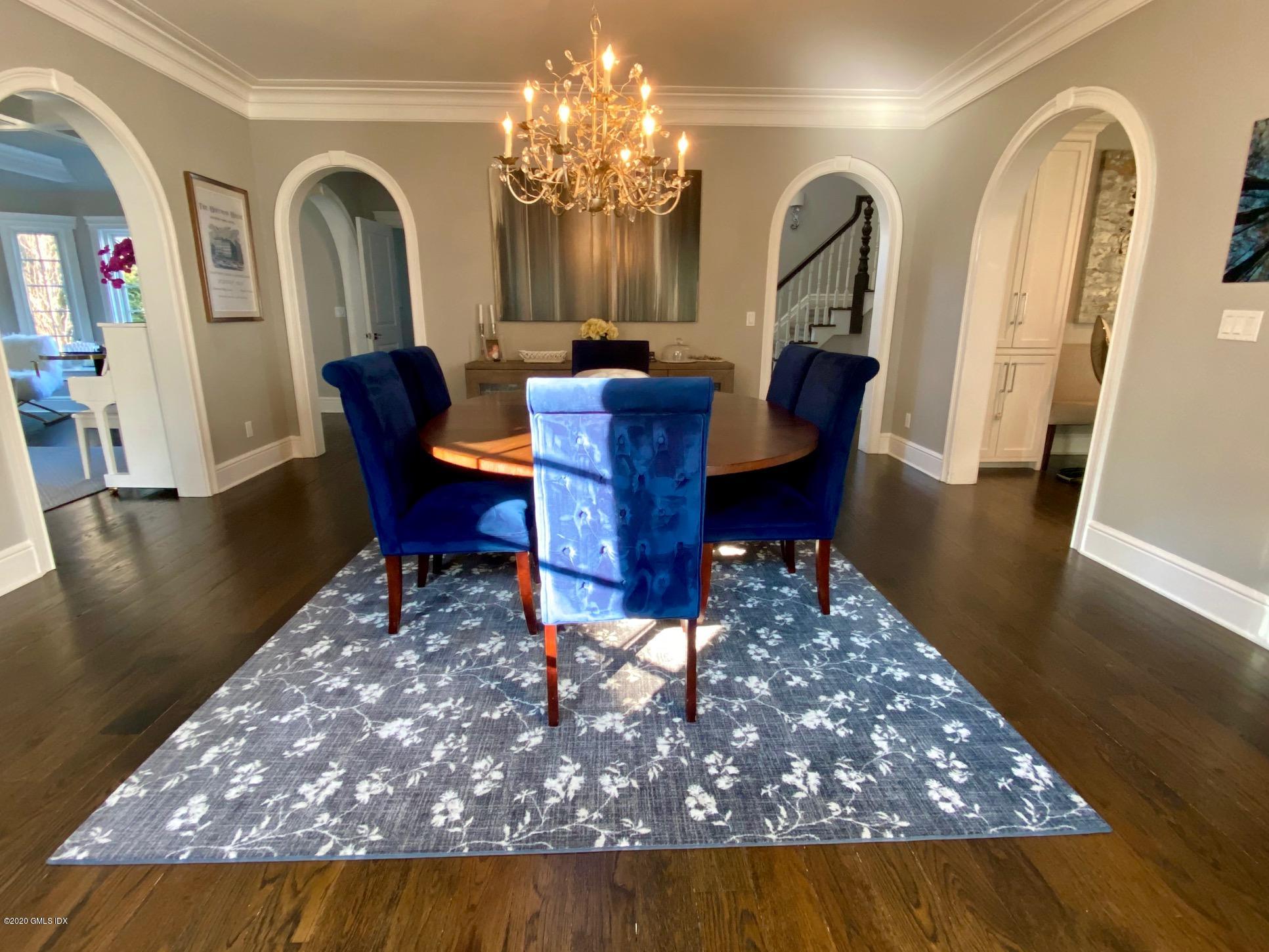1 Club Road Riverside, CT 06878 - Photo 13 of 37 a living room with dining table and wooden floor