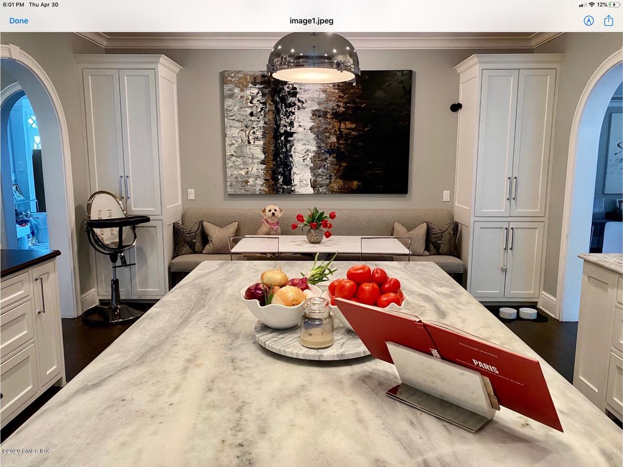 1 Club Road Riverside, CT 06878 - Photo 14 of 37 a bedroom with a bed and wooden floor