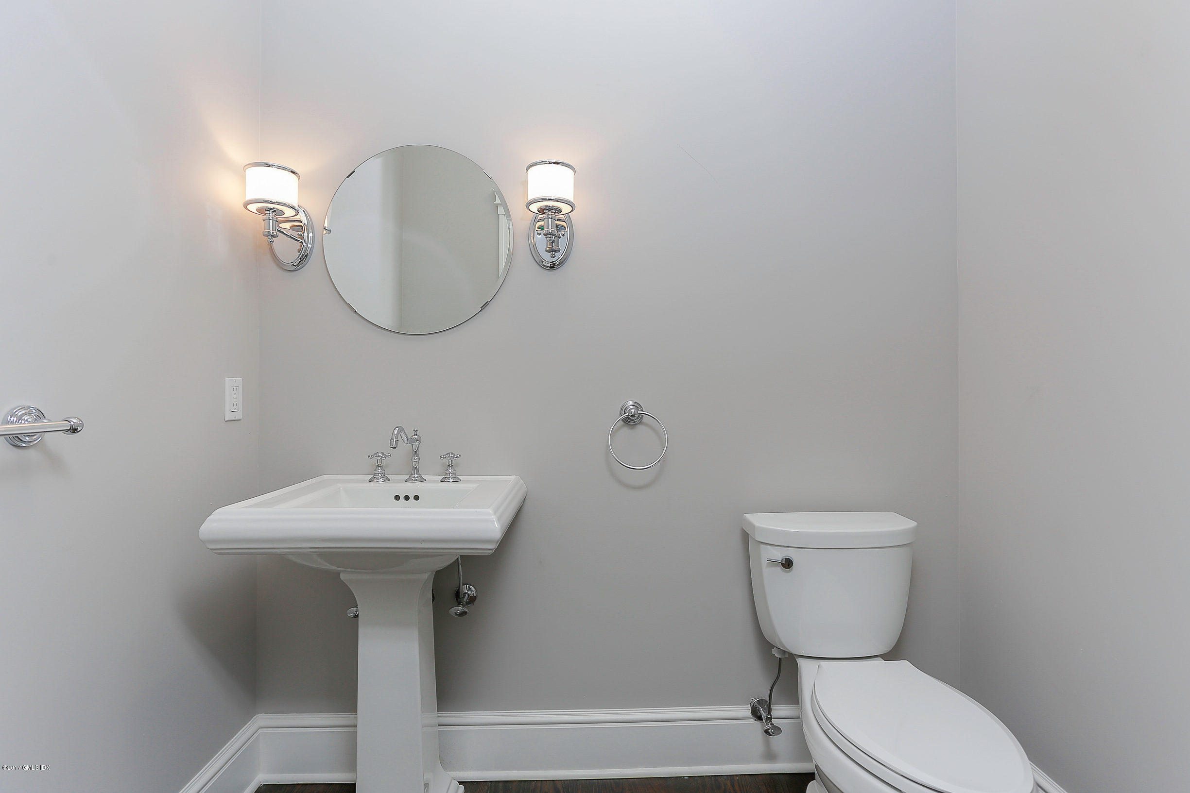 1 Club Road Riverside, CT 06878 - Photo 18 of 37 a bathroom with a toilet sink and mirror