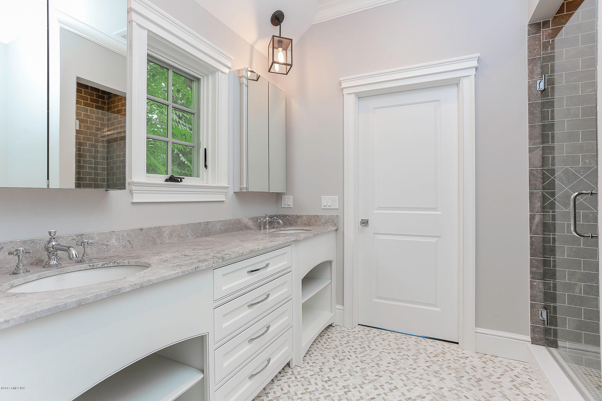 1 Club Road Riverside, CT 06878 - Photo 28 of 37 a bathroom with a granite countertop sink a mirror and a shower