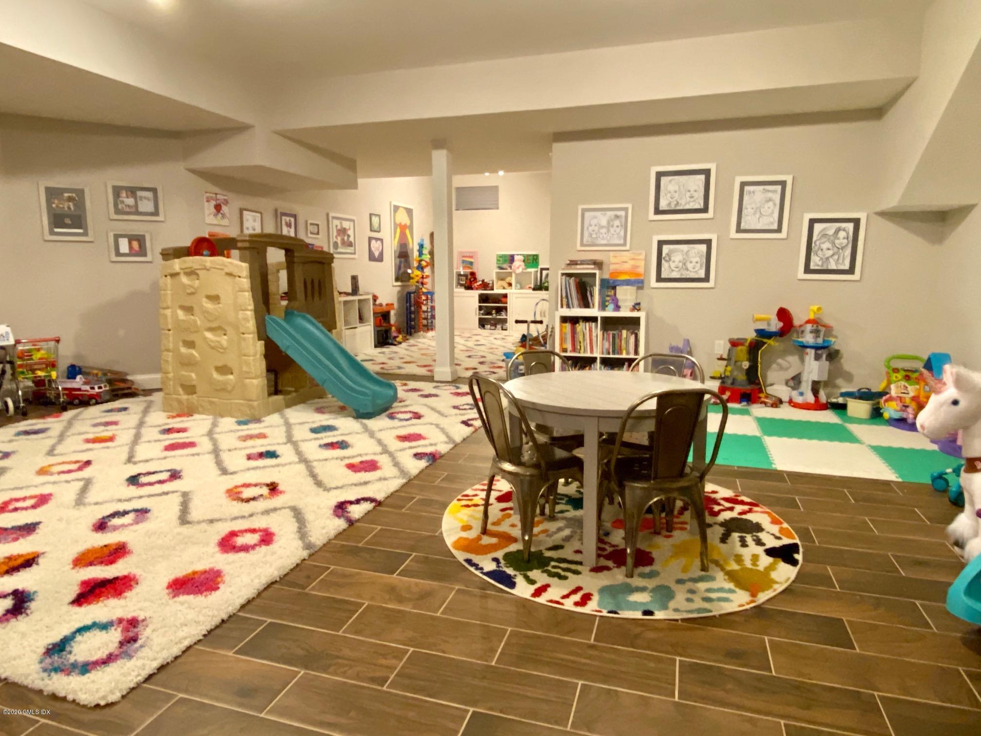 1 Club Road Riverside, CT 06878 - Photo 31 of 37 a view of a dining room with a table and chairs