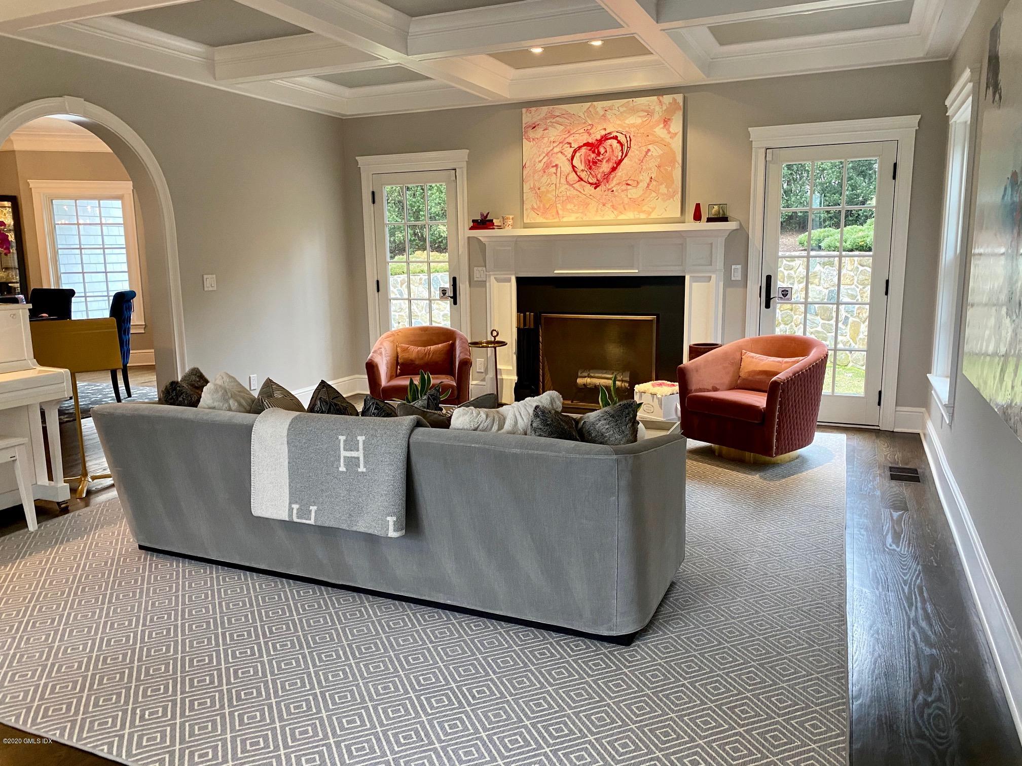 1 Club Road Riverside, CT 06878 - Photo 9 of 37 a living room with furniture and a fireplace