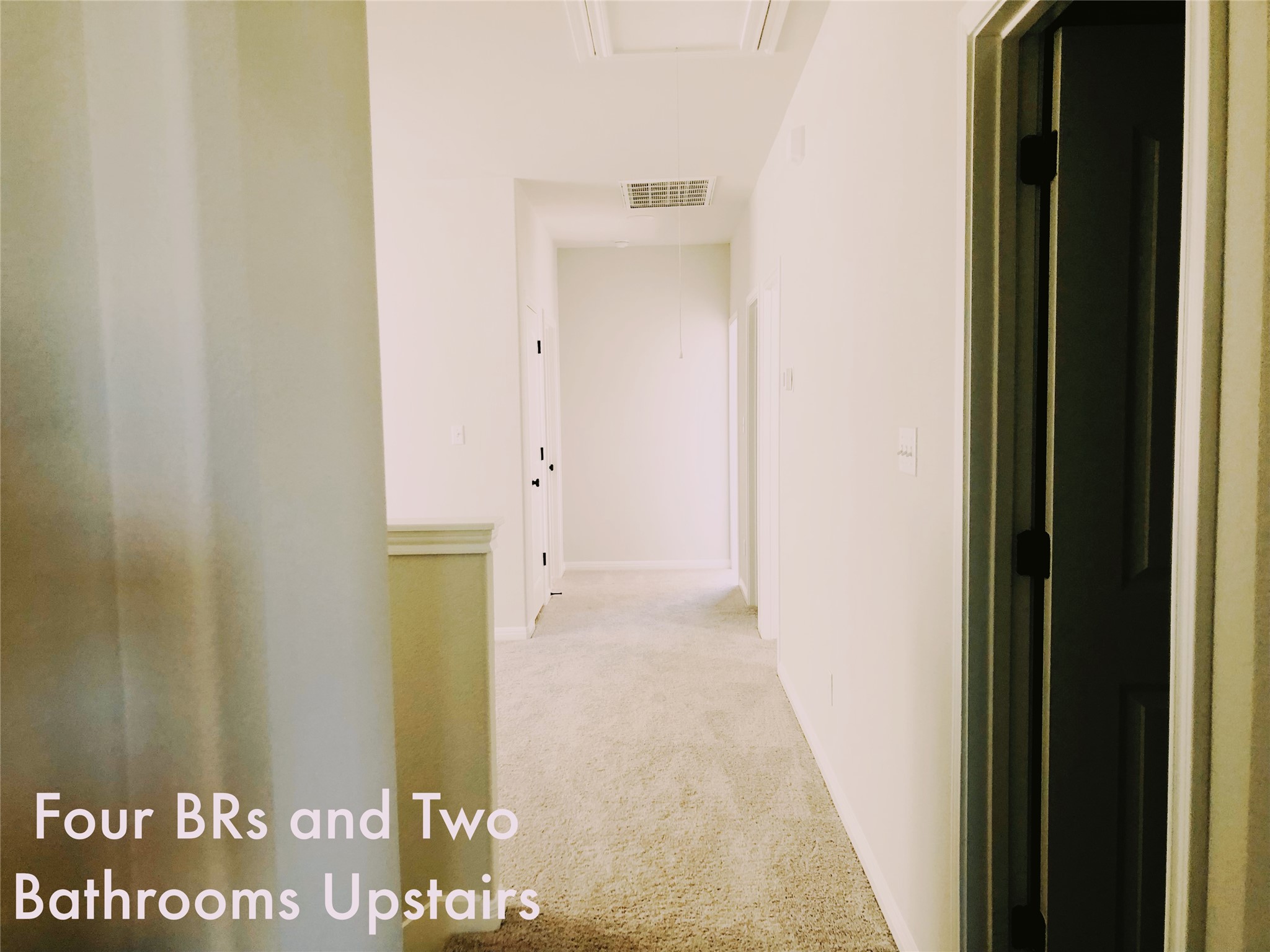 2536 Acoma Lane Leander, TX 78641 - Photo 12 of 26 Corridor with attic access and light carpet