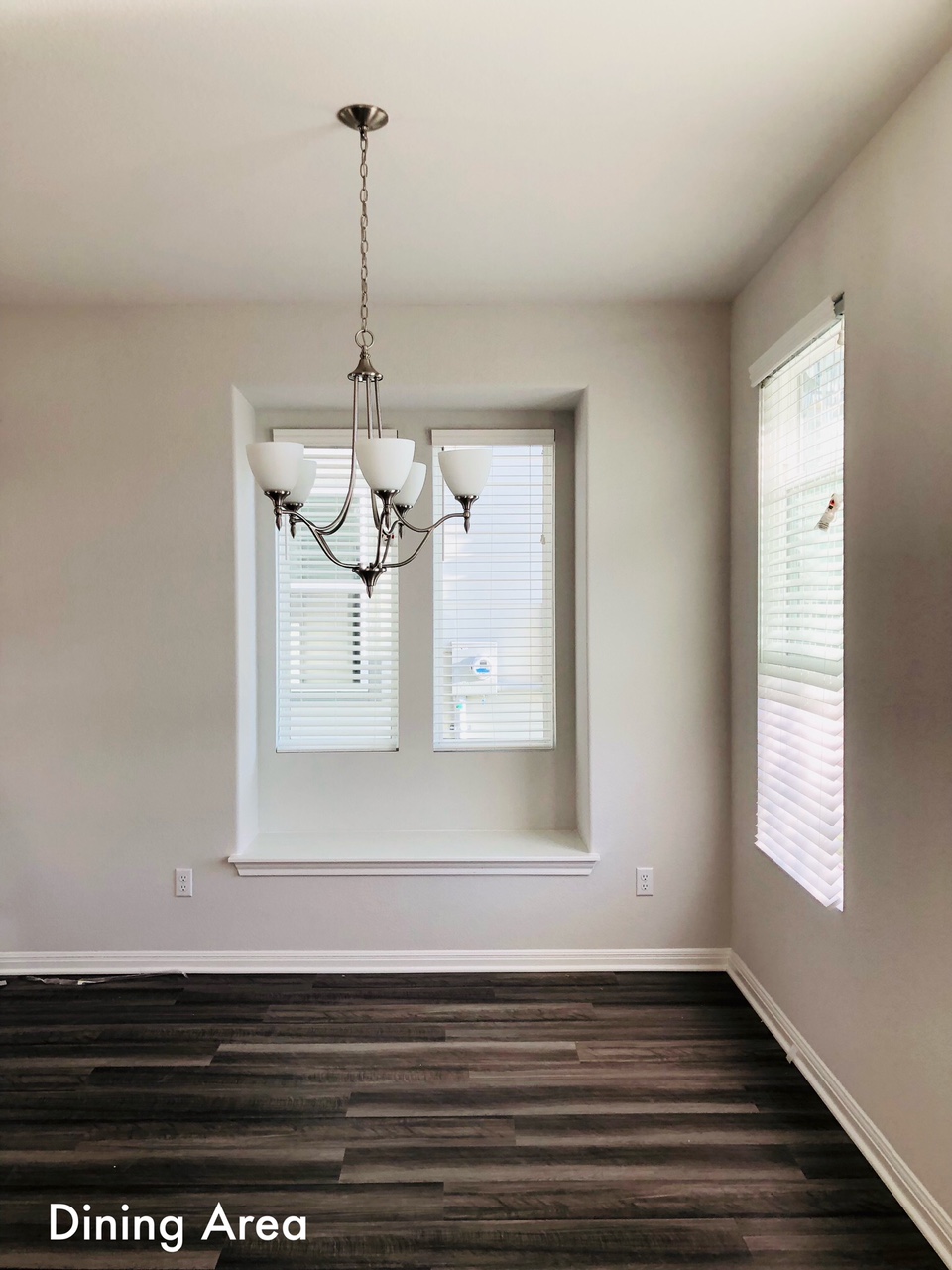 2536 Acoma Lane Leander, TX 78641 - Photo 9 of 26 Unfurnished dining area with dark wood-type flooring and hanging lights