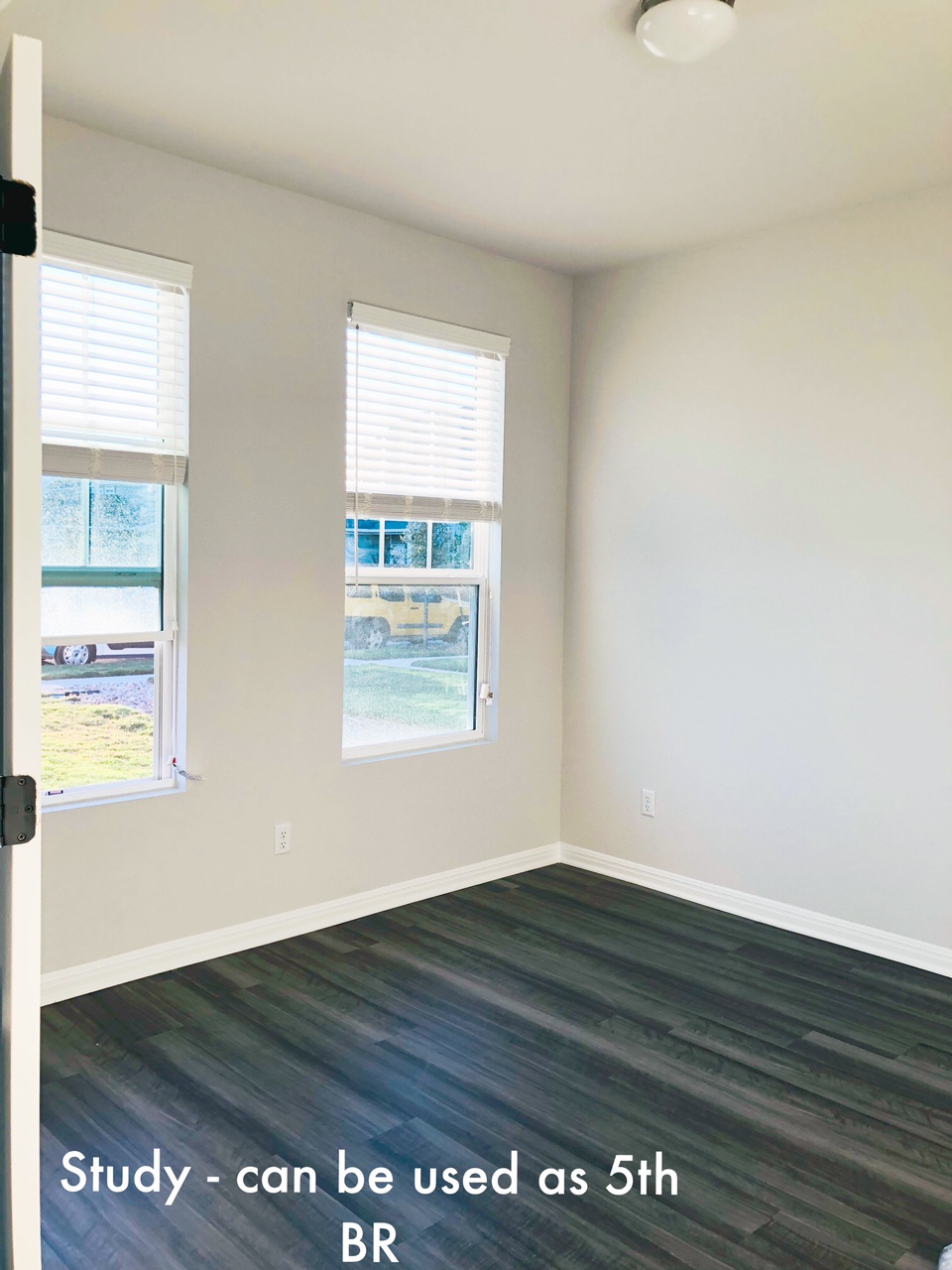 2536 Acoma Lane Leander, TX 78641 - Photo 10 of 26 Empty room featuring baseboards and dark wood-style floors