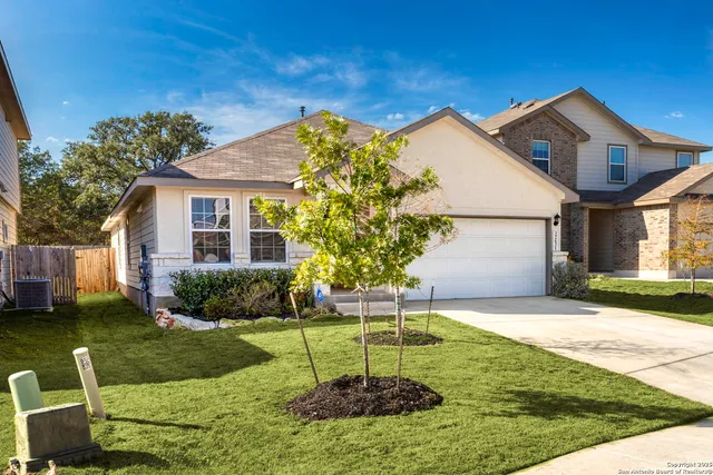 a house view with a garden space