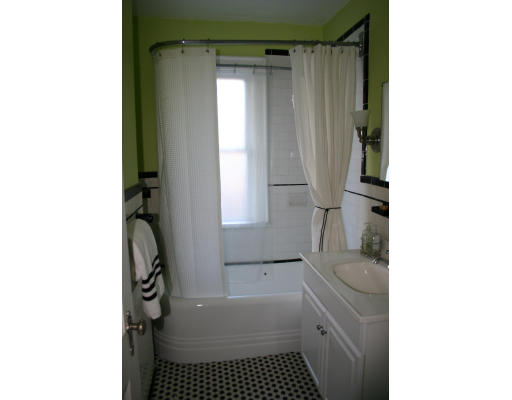 19 Sunset Road, Unit 19 Watertown, MA 02472 - Photo 13 of 17 a bathroom with a sink a toilet and shower
