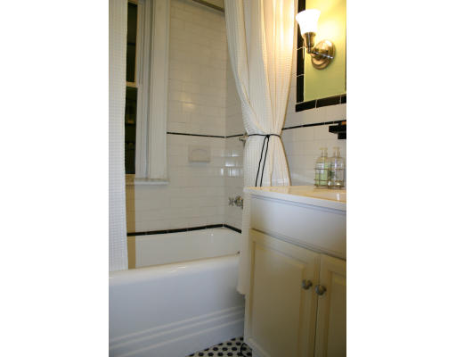19 Sunset Road, Unit 19 Watertown, MA 02472 - Photo 15 of 17 a bathroom with a bathtub and a shower