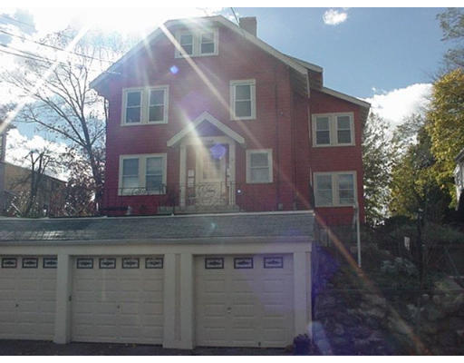 19 Sunset Road, Unit 19 Watertown, MA 02472 - Photo 17 of 17 a view of a house with a yard