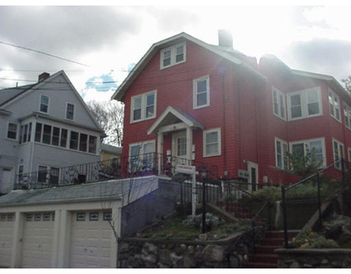 19 Sunset Road, Unit 19 Watertown, MA 02472 - Photo 3 of 17 a front view of a house with a yard