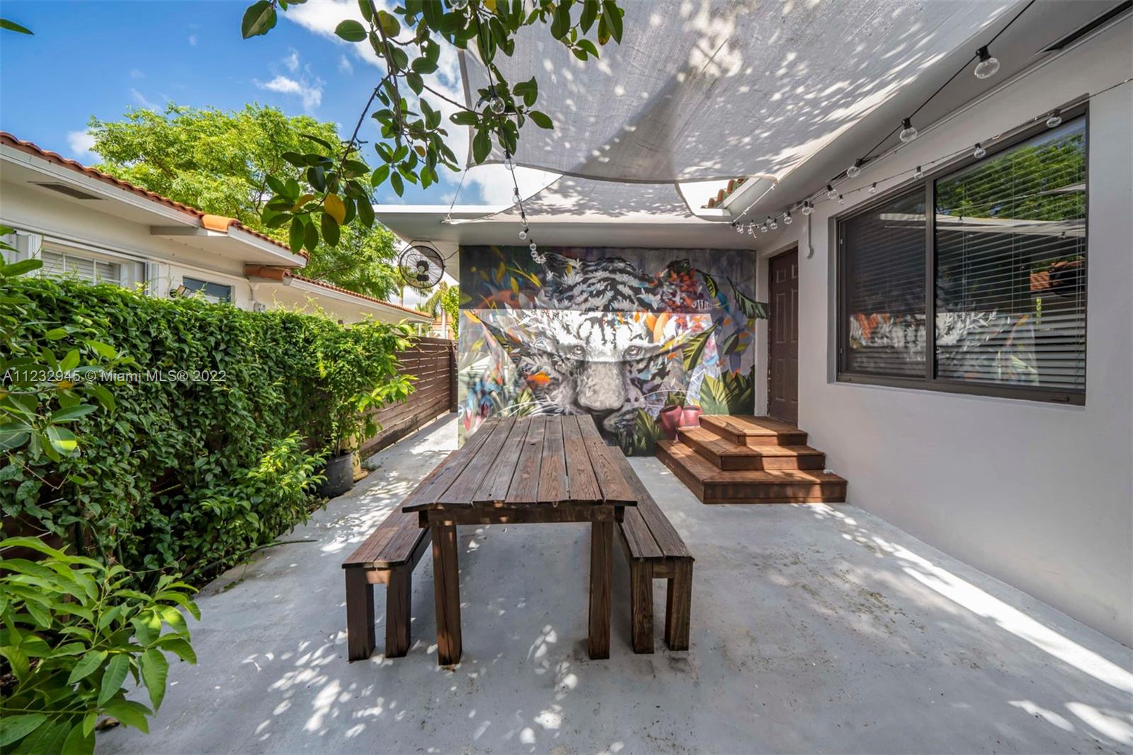 1598 Normandy Drive Miami Beach, FL 33141 - Photo 30 of 40 an outdoor space with seating