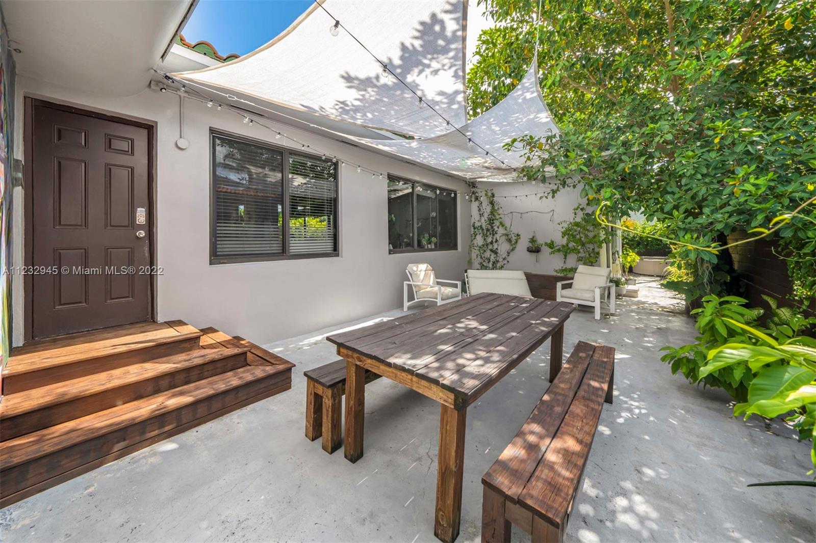 1598 Normandy Drive Miami Beach, FL 33141 - Photo 31 of 40 a outdoor space with furniture