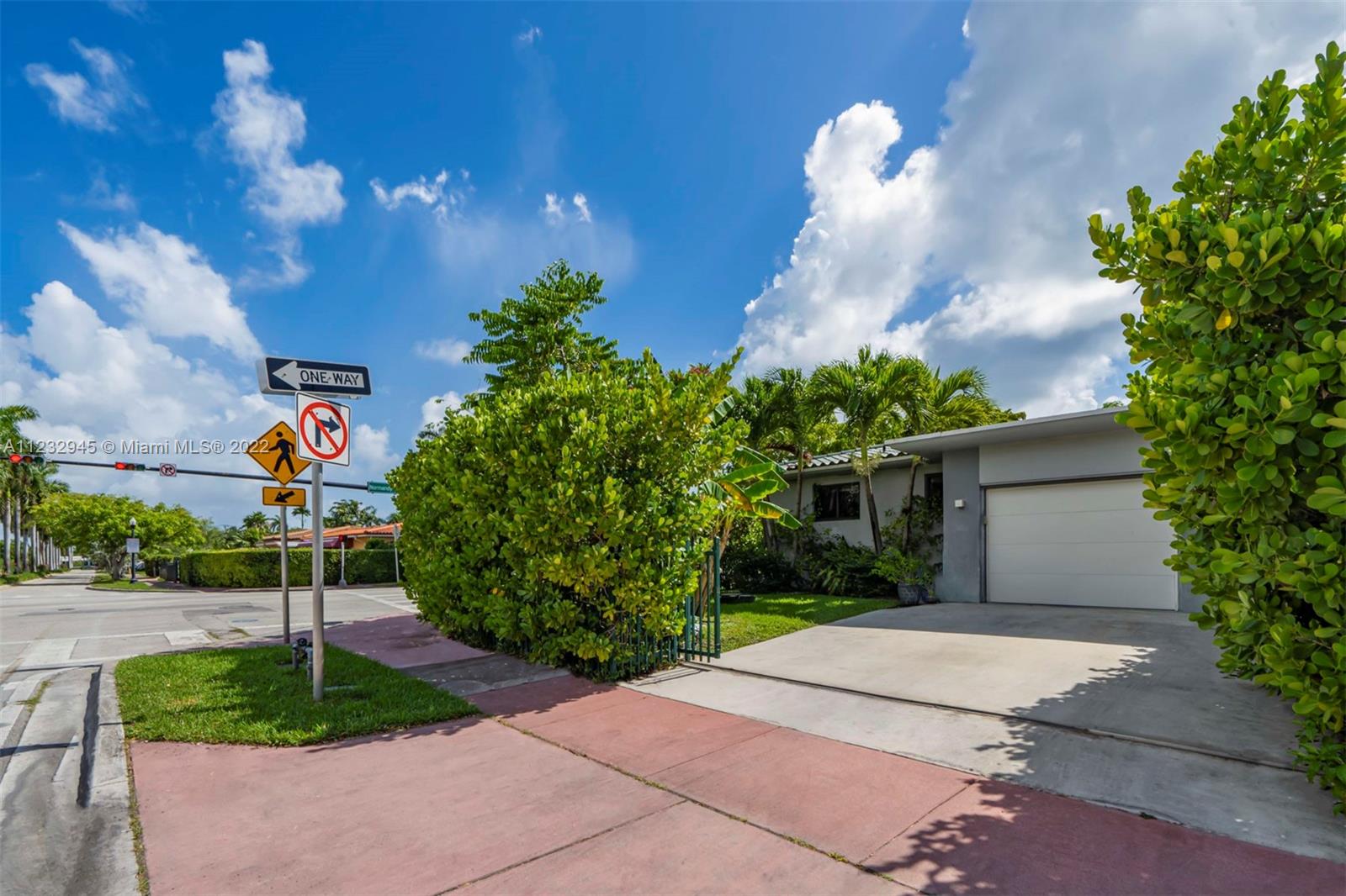 1598 Normandy Drive Miami Beach, FL 33141 - Photo 34 of 40 a backyard of a house with lots of green space