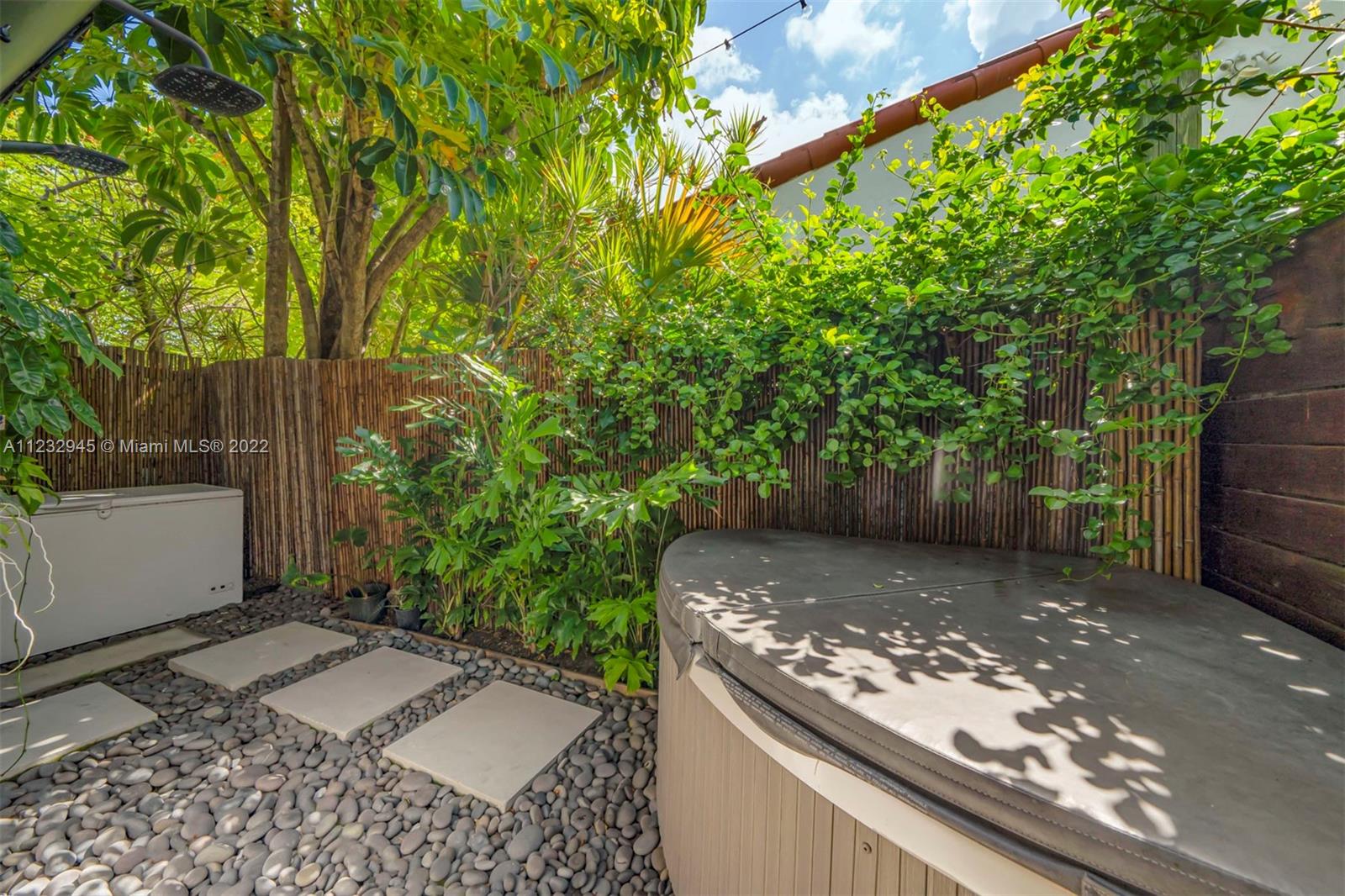 1598 Normandy Drive Miami Beach, FL 33141 - Photo 8 of 40 a view of a backyard