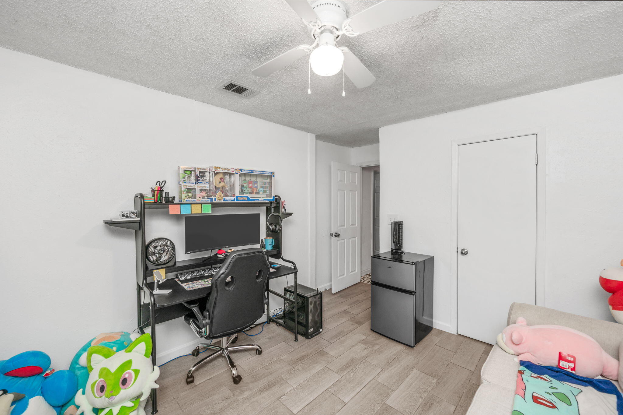 205 Pine Street Fort Walton Beach, FL 32548 - Photo 11 of 20 a view of a workspace with furniture and toys