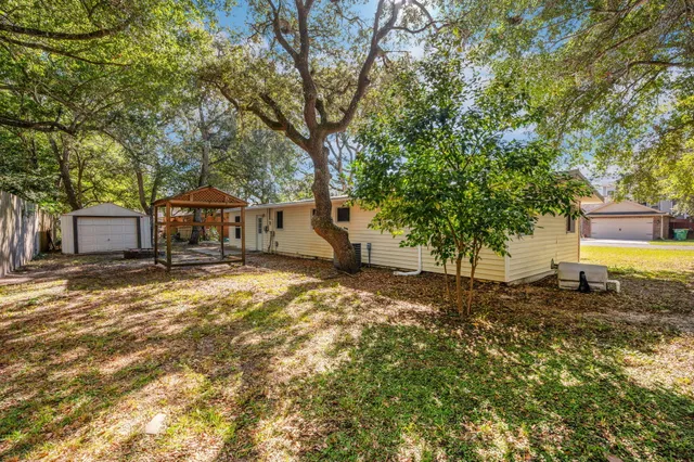 a view of backyard with green space