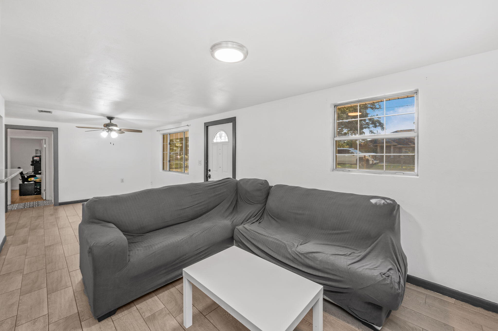 205 Pine Street Fort Walton Beach, FL 32548 - Photo 3 of 20 a living room with furniture and a window