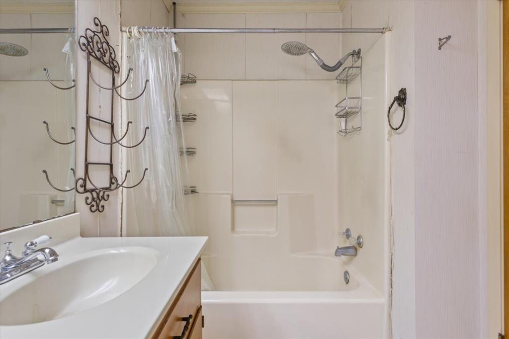 1832 West White Oak Road West, TX 76691 - Photo 21 of 30 a bathroom with a shower and a sink