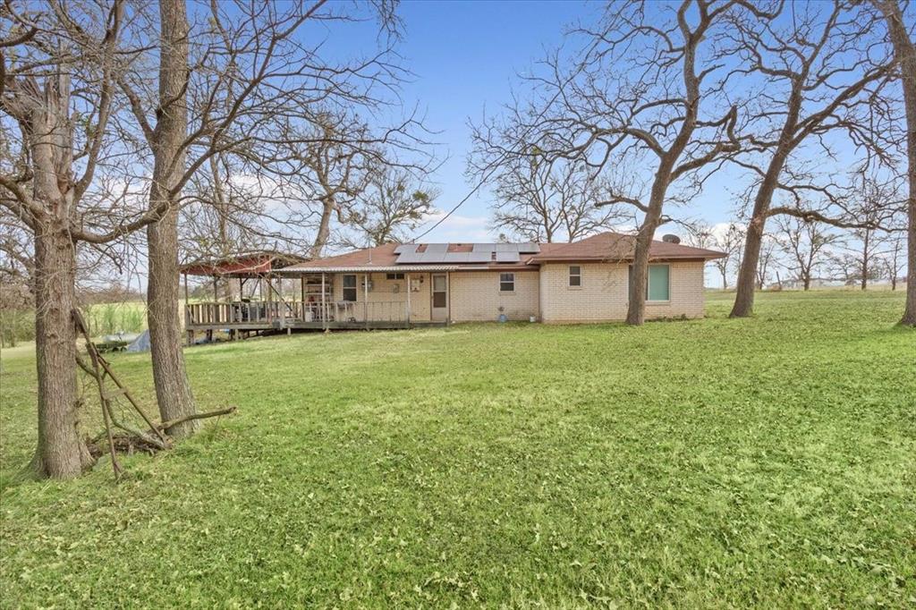 1832 West White Oak Road West, TX 76691 - Photo 26 of 30 a view of a house with a yard