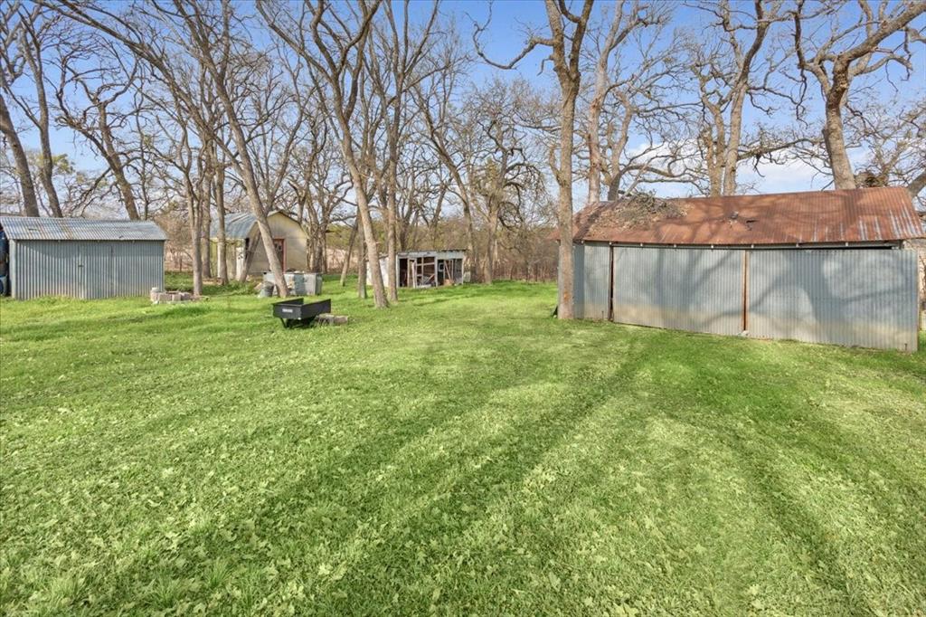 1832 West White Oak Road West, TX 76691 - Photo 29 of 30 front view of a house with a yard