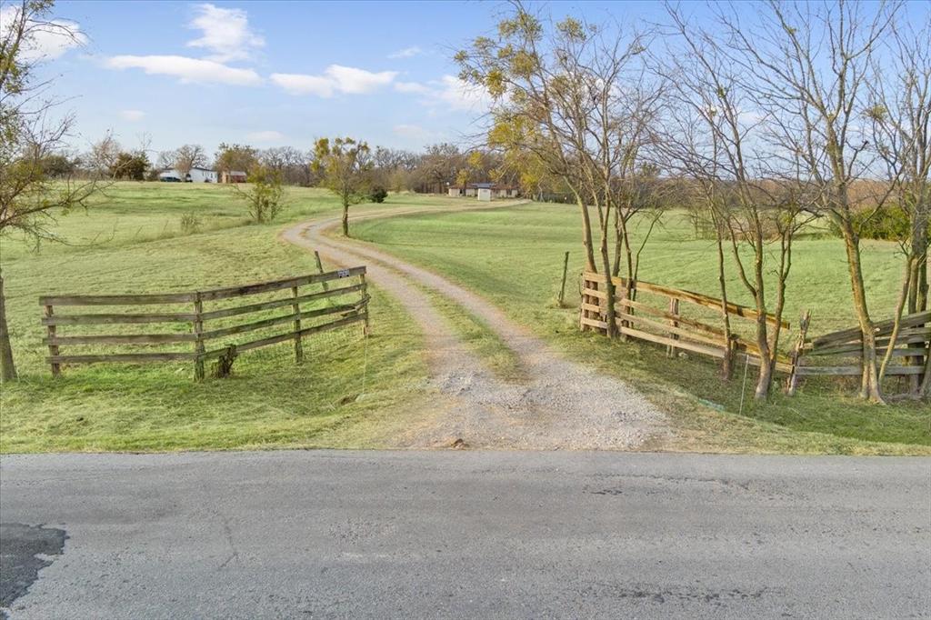 1832 West White Oak Road West, TX 76691 - Photo 3 of 30 a view of an outdoor space and a yard