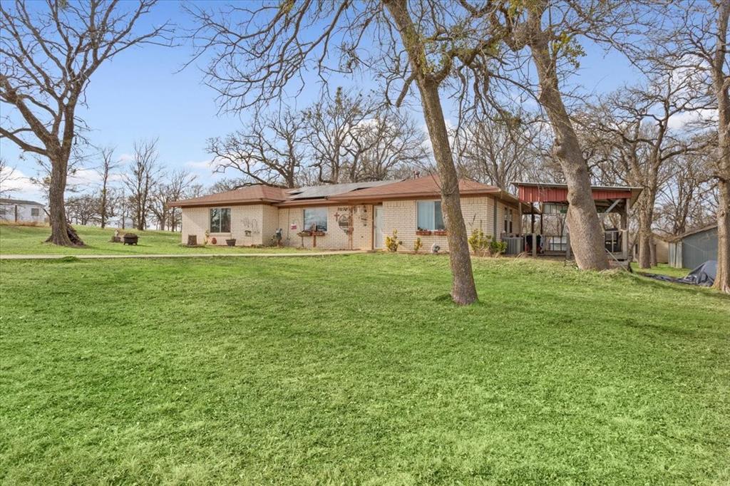 1832 West White Oak Road West, TX 76691 - Photo 6 of 30 a house view with garden space