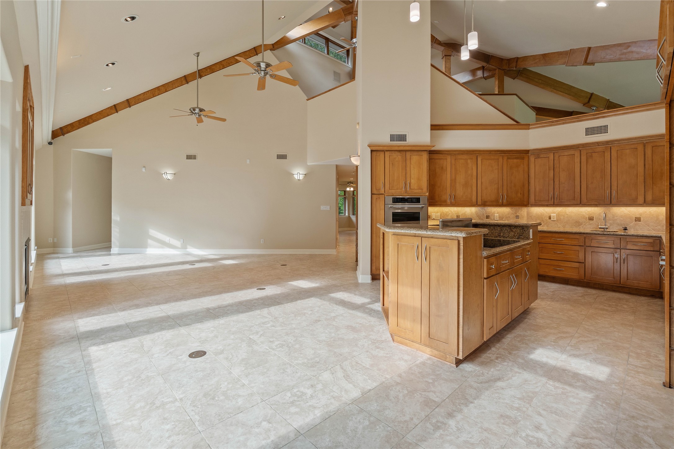 16621 Hereford Road Tomball, TX 77377 - Photo 12 of 46 a kitchen with a stove and a microwave