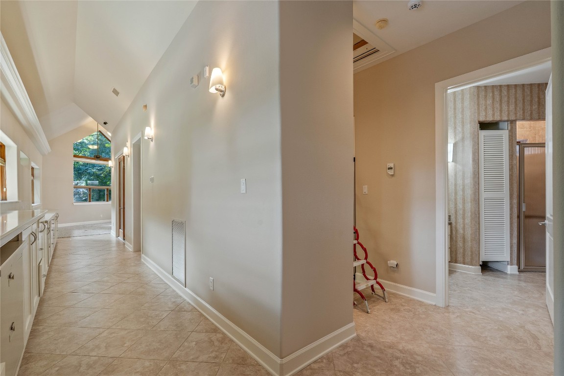16621 Hereford Road Tomball, TX 77377 - Photo 33 of 46 a view of a hallway with bathroom and front door