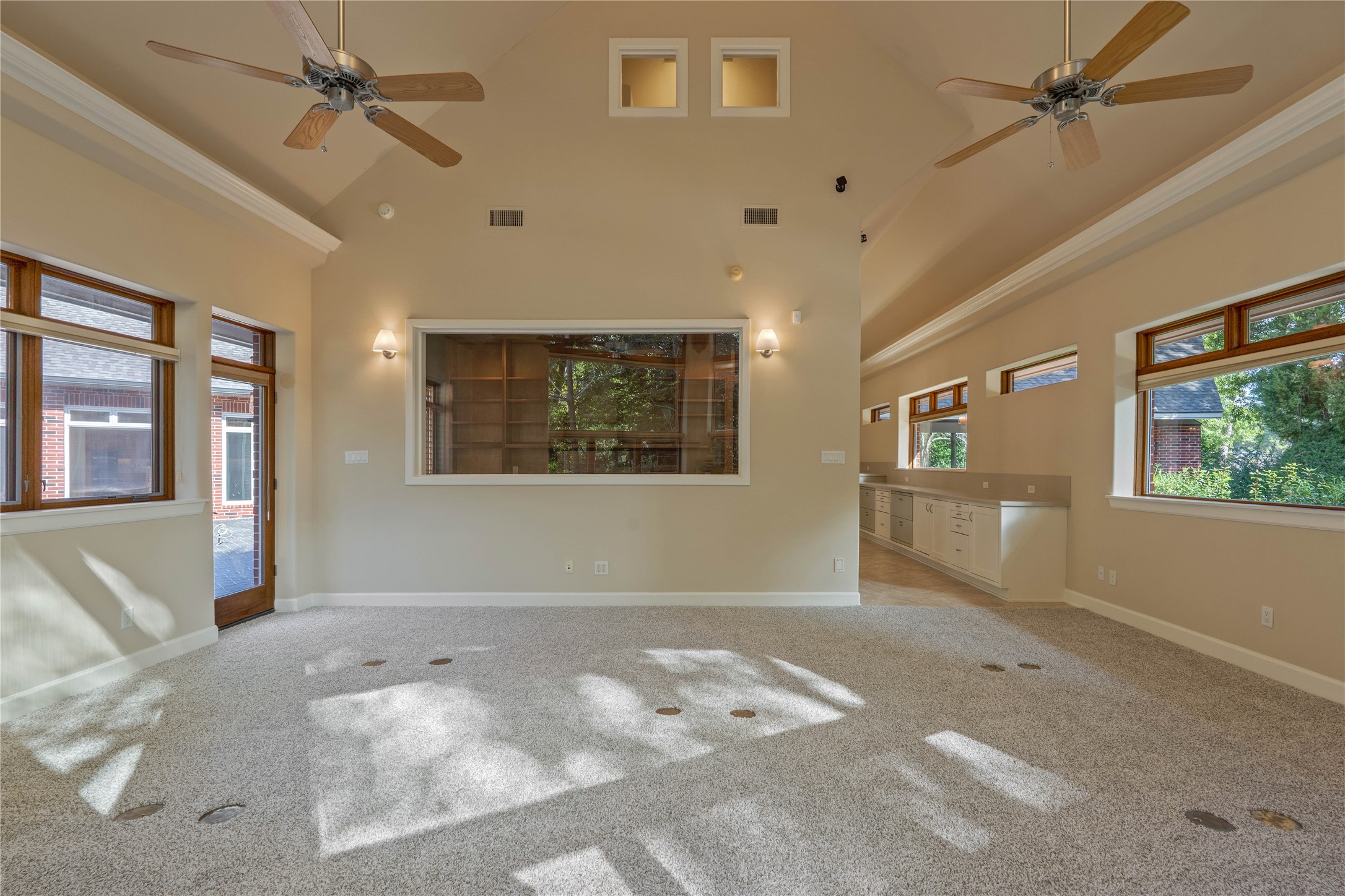 16621 Hereford Road Tomball, TX 77377 - Photo 38 of 46 Another angle of the spacious conference room, featuring high ceilings, elegant windows, and ample natural light.