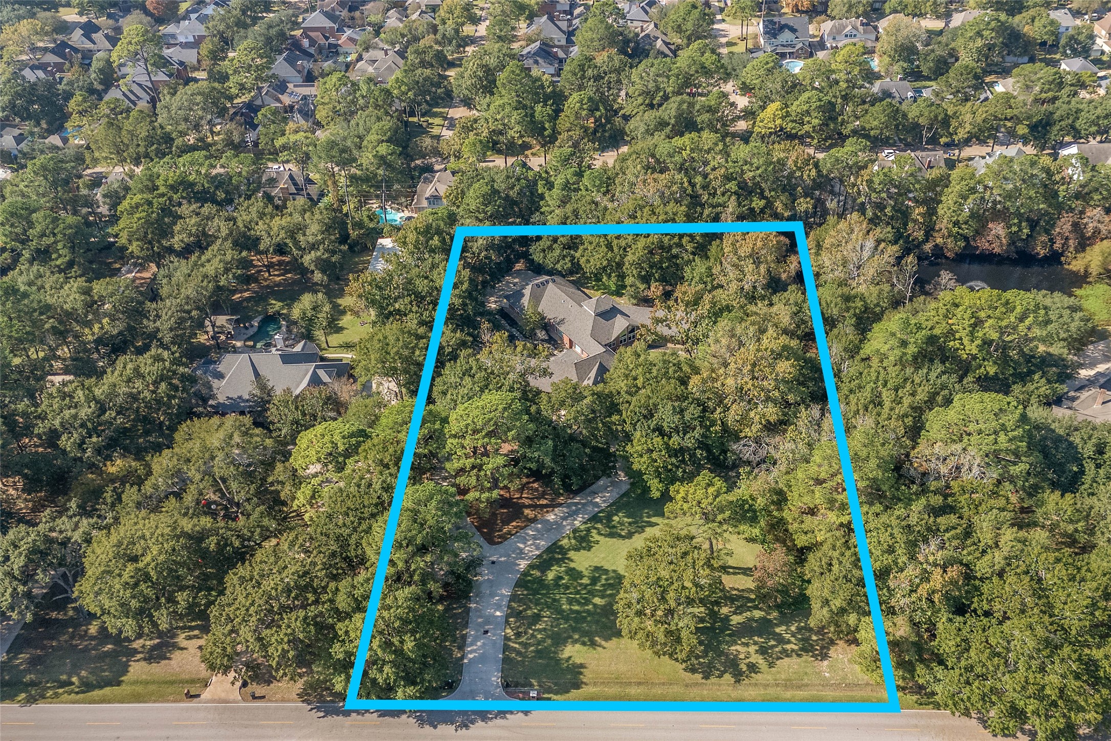 16621 Hereford Road Tomball, TX 77377 - Photo 42 of 46 Nestled in lush greenery, this stunning property offers privacy and tranquility, featuring a spacious home surrounded by nature, perfect for serene living.