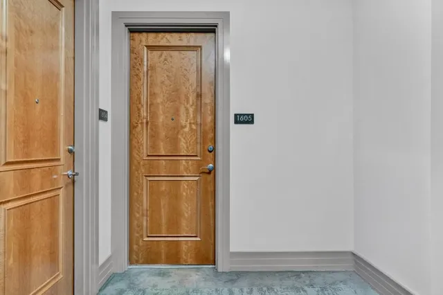 a view of swimming pool with chairs