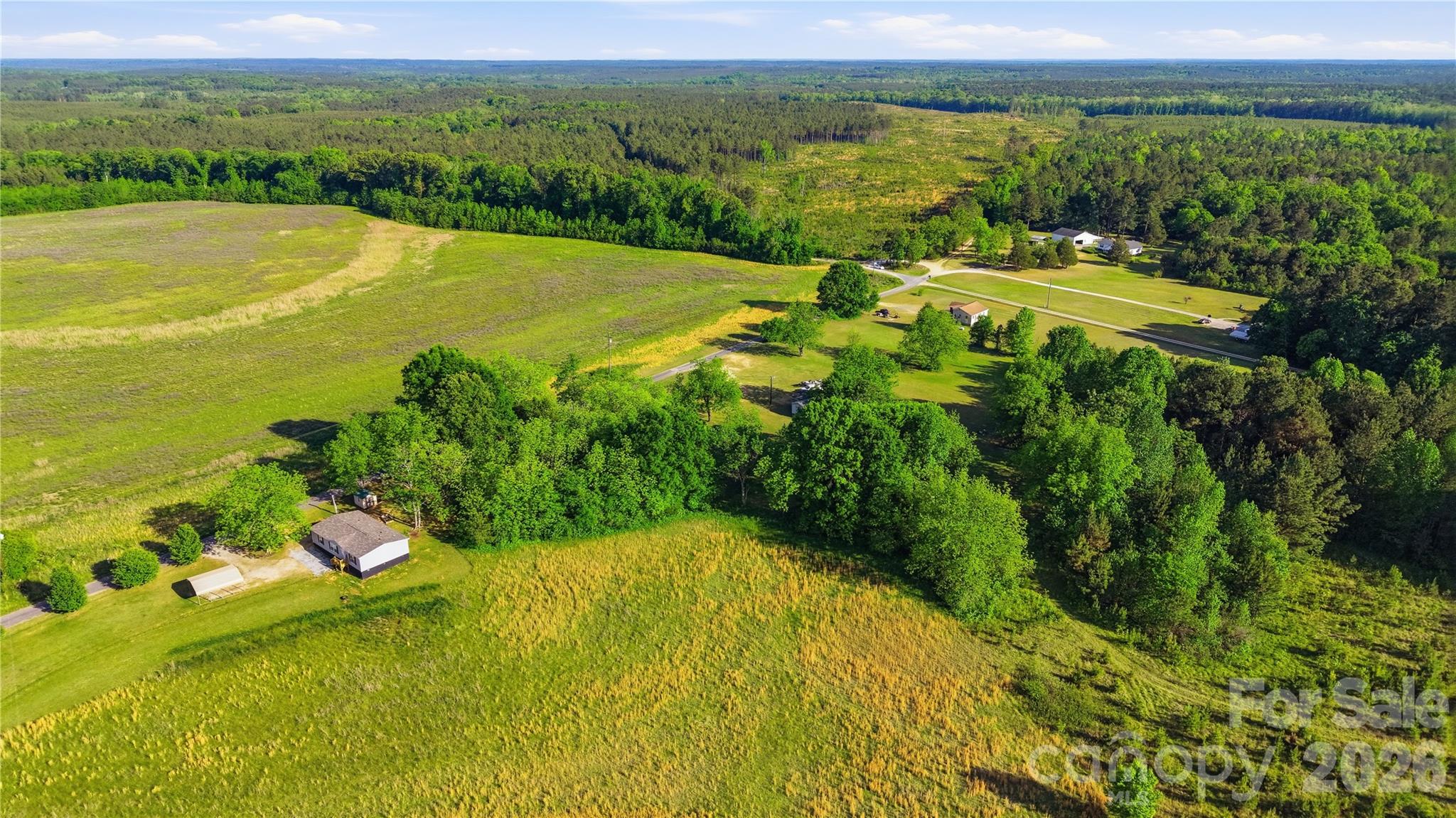 2004 Discovery Road Blackstock, SC 29014 - Photo 5 of 11 a view of a lake with a big yard