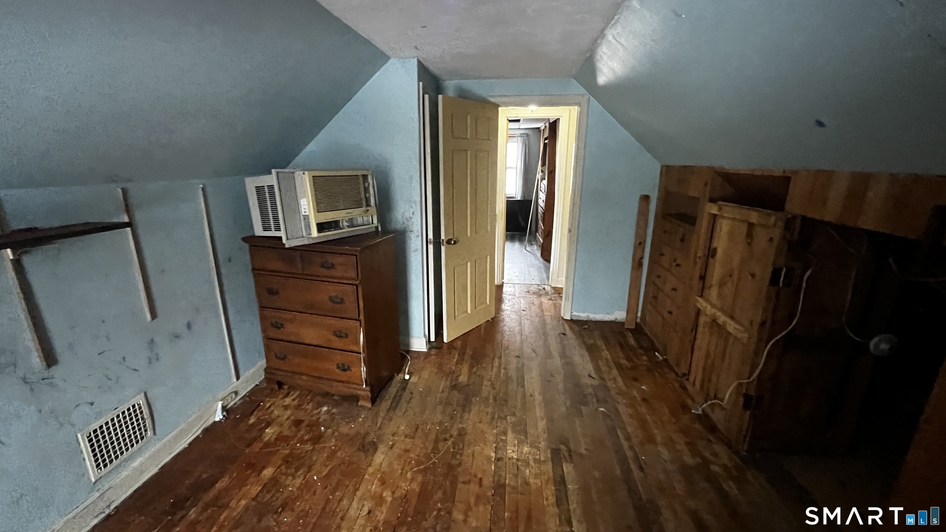 175 Moody Street Bristol, CT 06010 - Photo 18 of 22 a view of front door with wooden floor and stairs