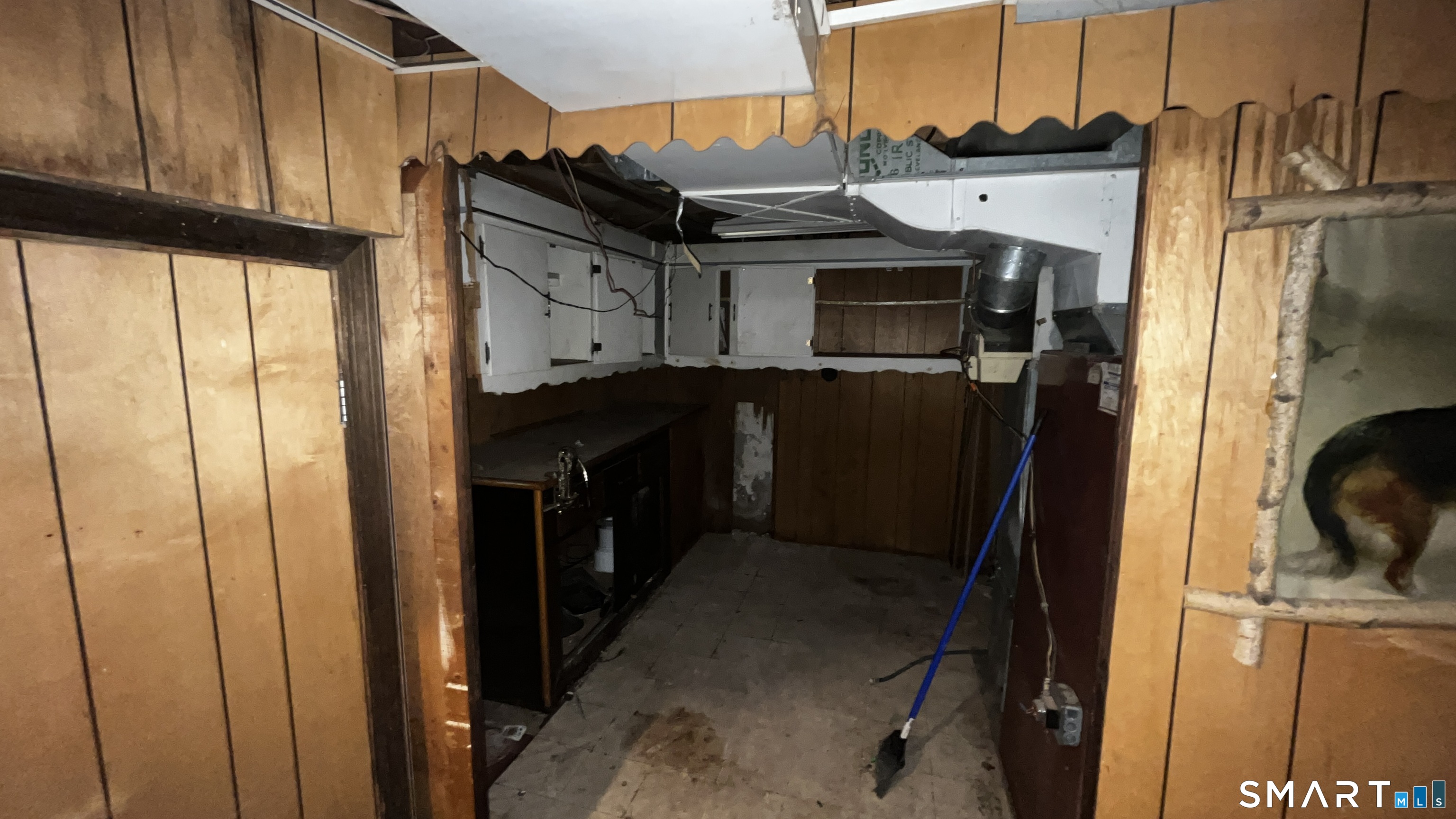 175 Moody Street Bristol, CT 06010 - Photo 21 of 22 a kitchen with a refrigerator and a stove