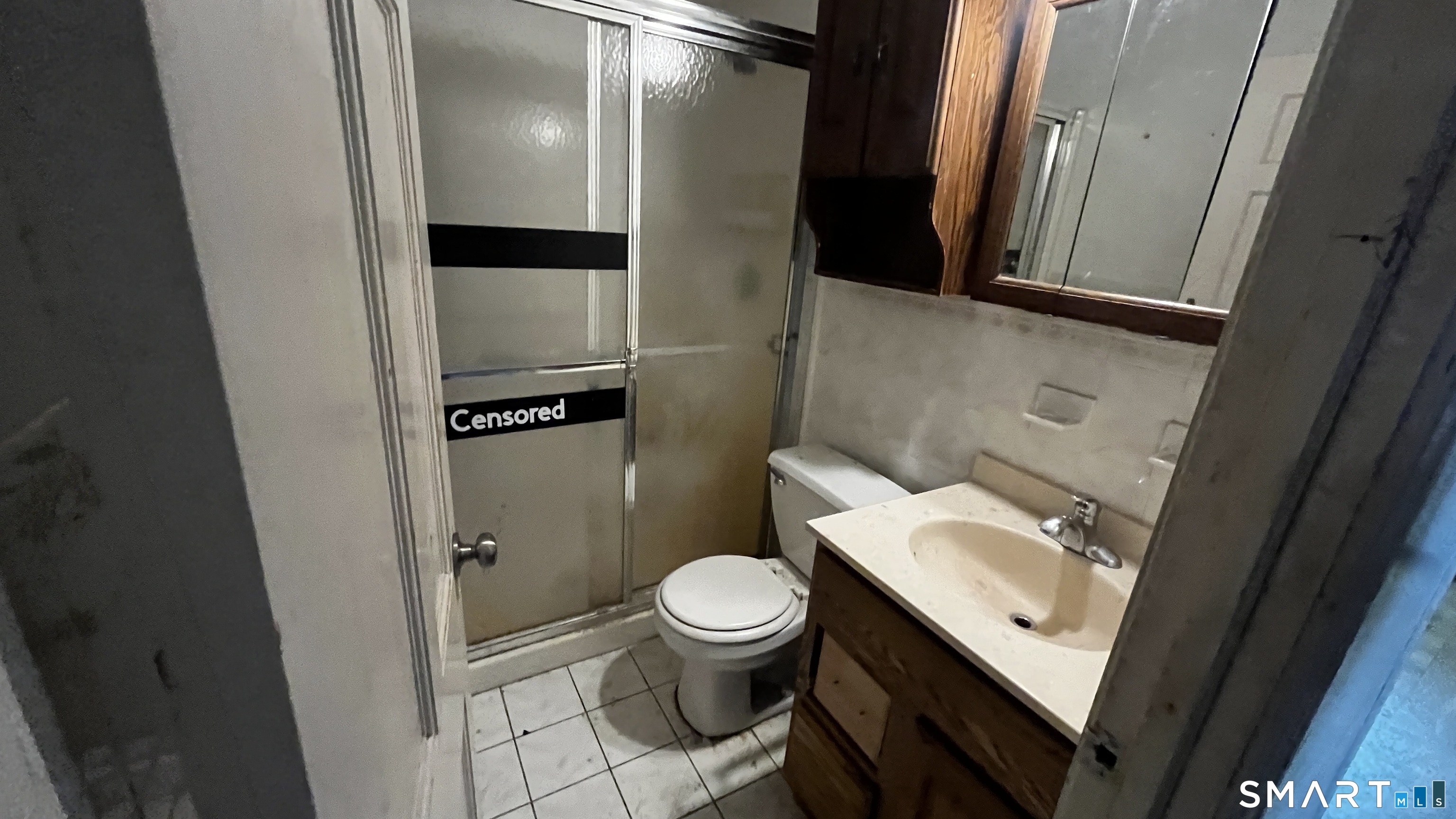 175 Moody Street Bristol, CT 06010 - Photo 9 of 22 a bathroom with a granite countertop toilet and a sink