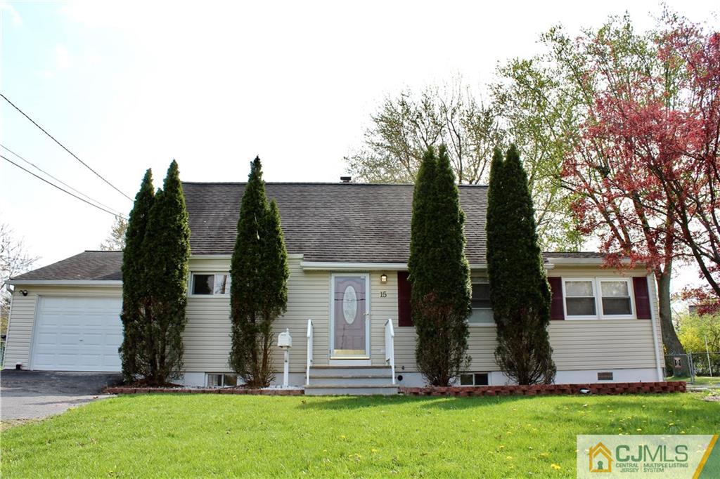 15 Roberts Road New Brunswick, NJ 08901 - Photo 1 of 25 front view of house with a yard