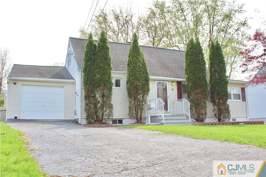 15 Roberts Road New Brunswick, NJ 08901 - Photo 3 of 25 front view of house with a yard